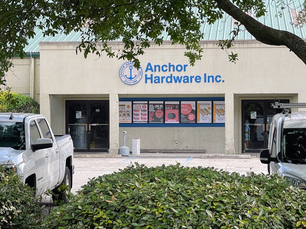 Anchor Hardware Inc. in Bluffton — the blue anchor sign, sale posters in the windows and work trucks out front