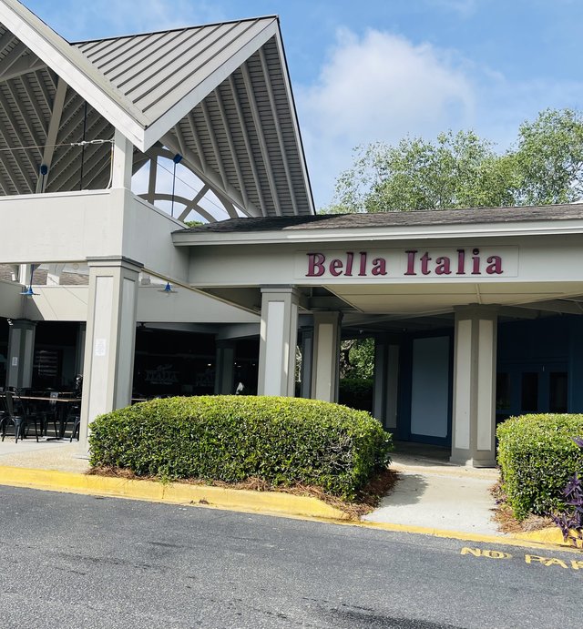 Bella Italia restaurant entrance under the steep gabled roof on Mathews Drive, Hilton Head Island