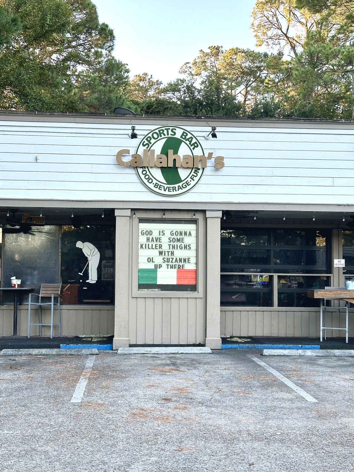Front exterior and parking lot of Callahan's Sports Bar on Hilton Head Island