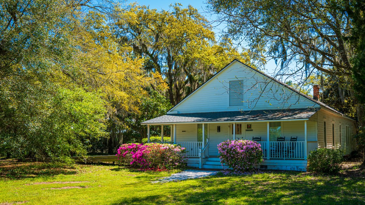 Discovery House. The museum’s main house in spring, azaleas out along the porch.