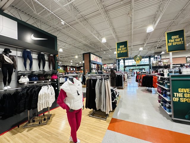 Dick's Sporting Goods interior with Nike wall, mannequins and Give the Gift of Sport banners, Bluffton SC