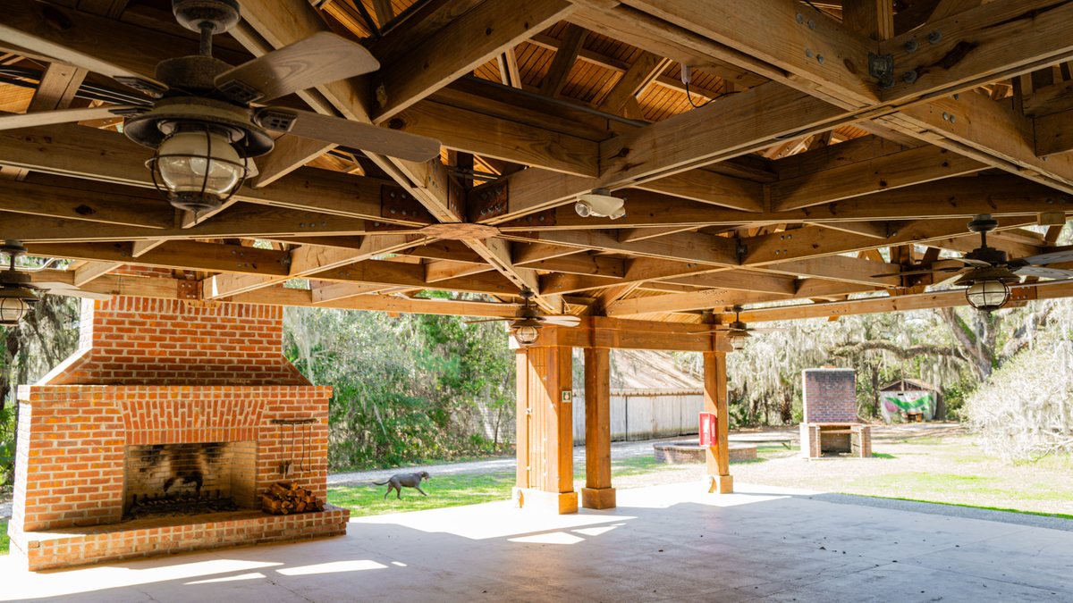 The pavilion fireplace. The brick fireplace anchors one end of the pavilion.