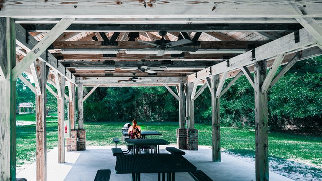 Under the pavilion.