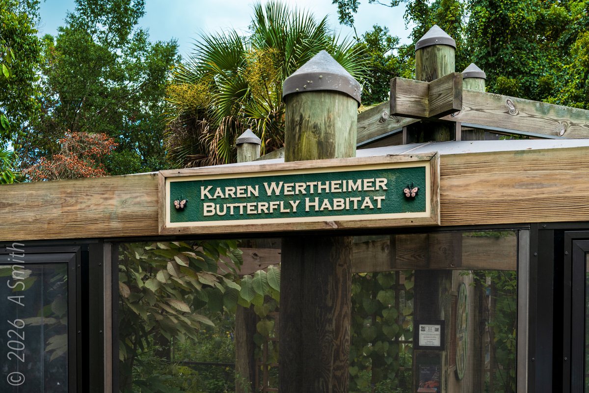 Karen Wertheimer Butterfly Habitat. The name sign over the entrance — the habitat honors Karen Wertheimer.
