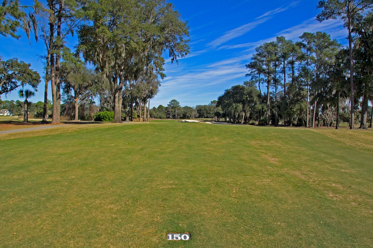 South Course, Hole 11. The par-5 11th on the South — the 150 marker stands in the fairway.