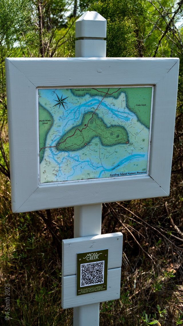 The trail map sign.