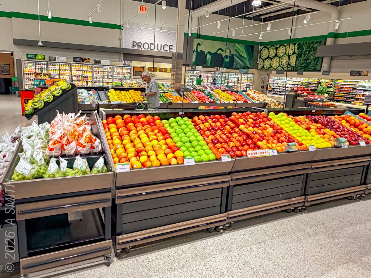 Publix produce department with rainbow apple display, Bluffton SC
