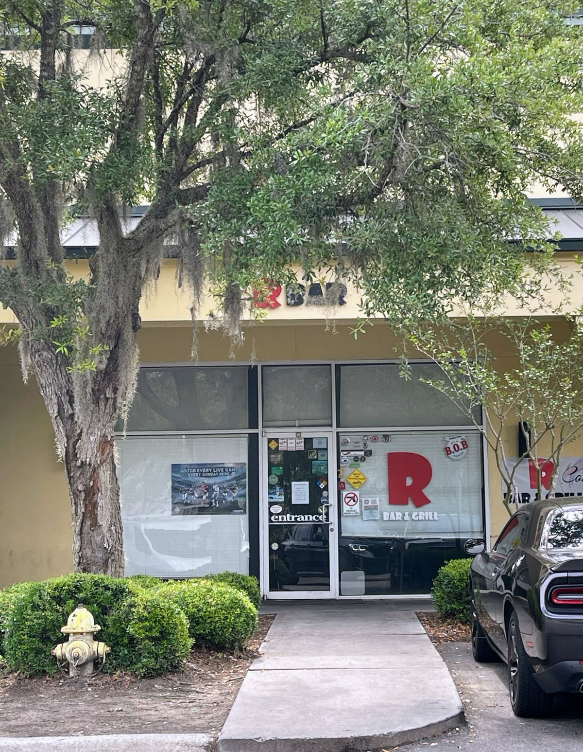 R Bar & Grill storefront under a moss-draped oak, big red R in the window, Bluffton SC