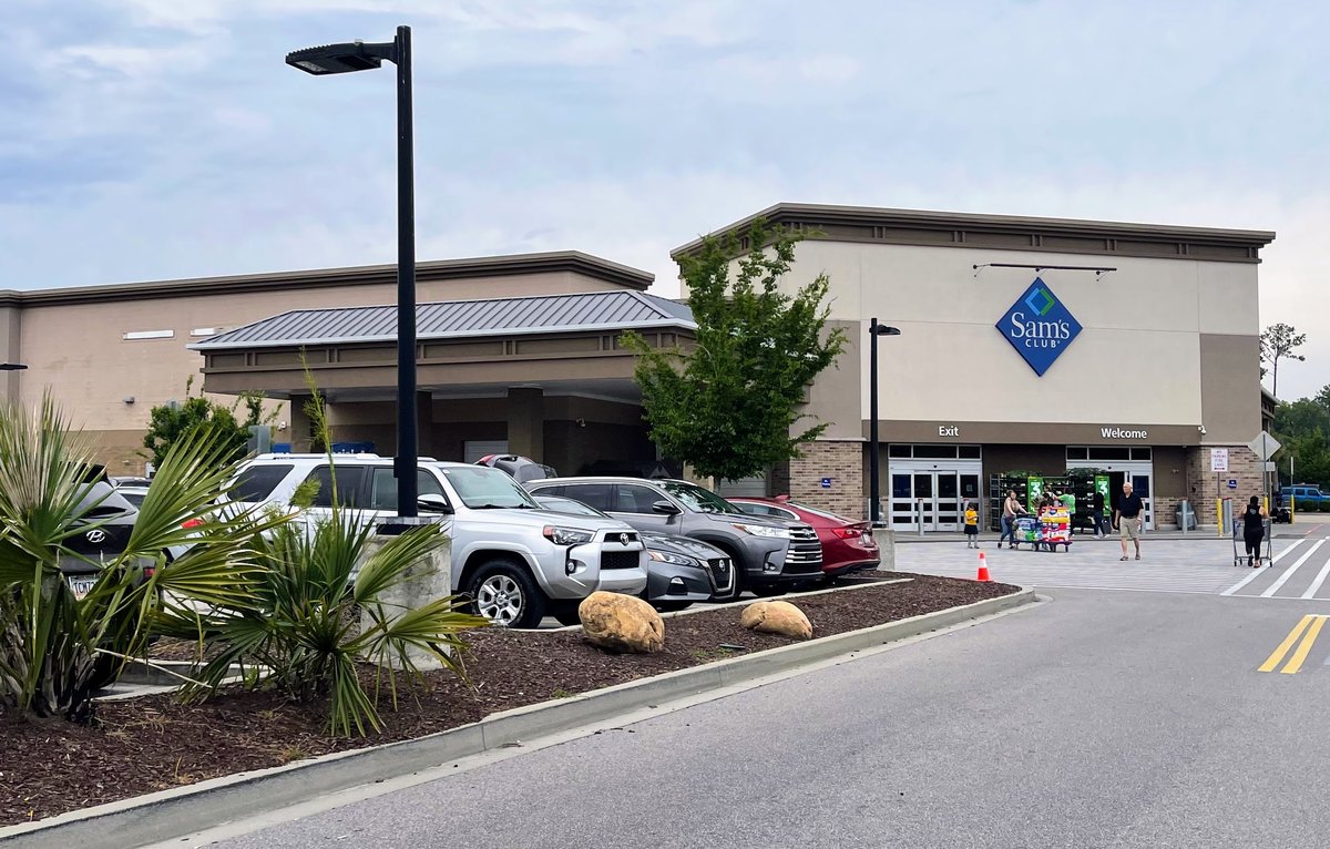 Sam's Club in Bluffton — the blue diamond sign over the Exit and Welcome doors, carts and cars out front