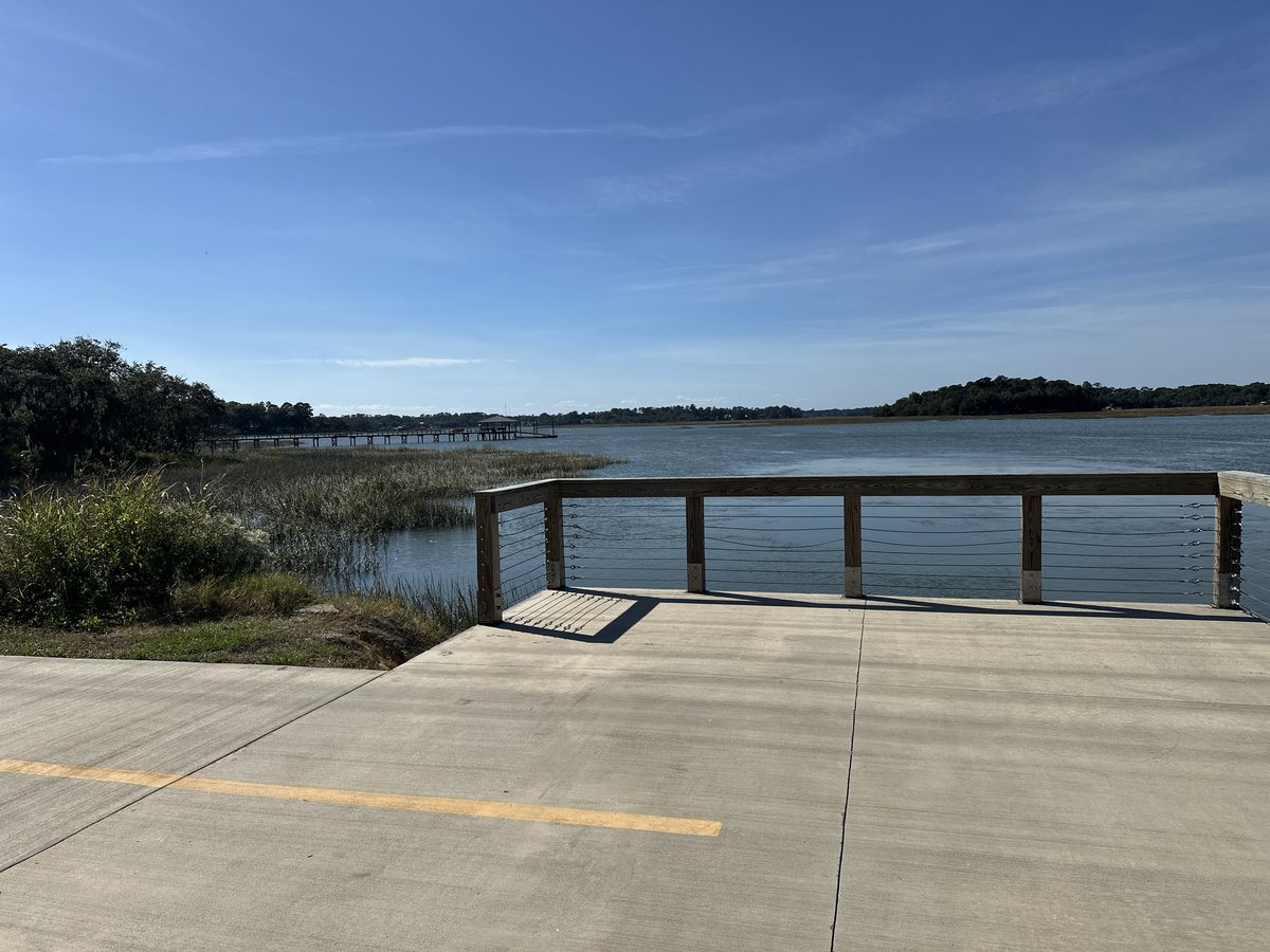The overlook. The deck's wide end above the river.