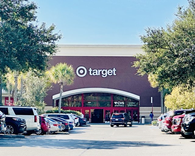The Bluffton Target storefront — the bullseye over the arched entrance, CVS pharmacy inside, full parking lot