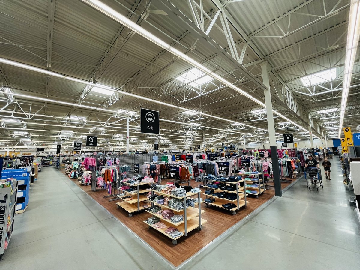 Inside the Bluffton Walmart — the girls clothing department, racks of clothes under the high ceiling